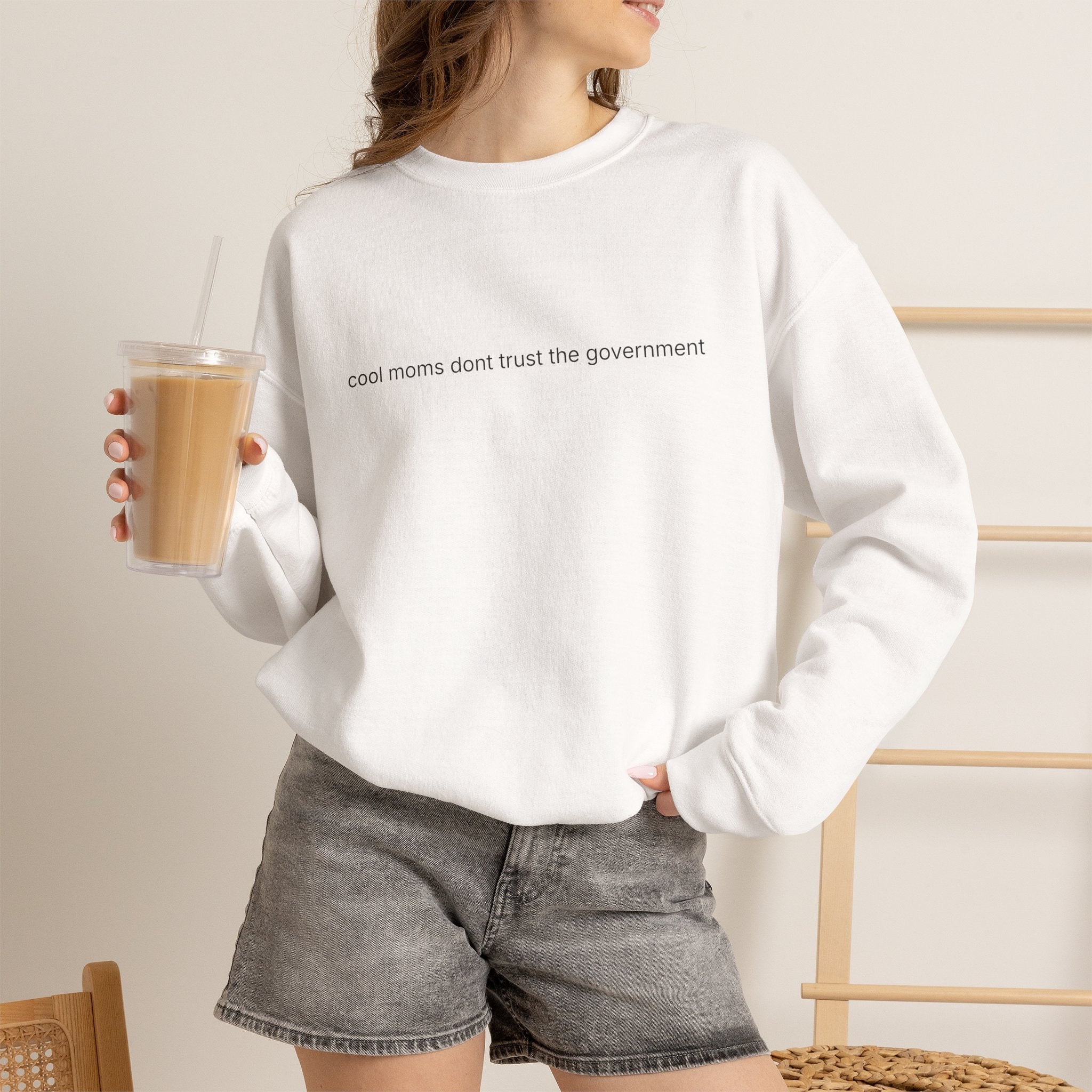 Crewneck Sweatshirt — "Cool Moms Don't Trust the Government" Minimal Graphic